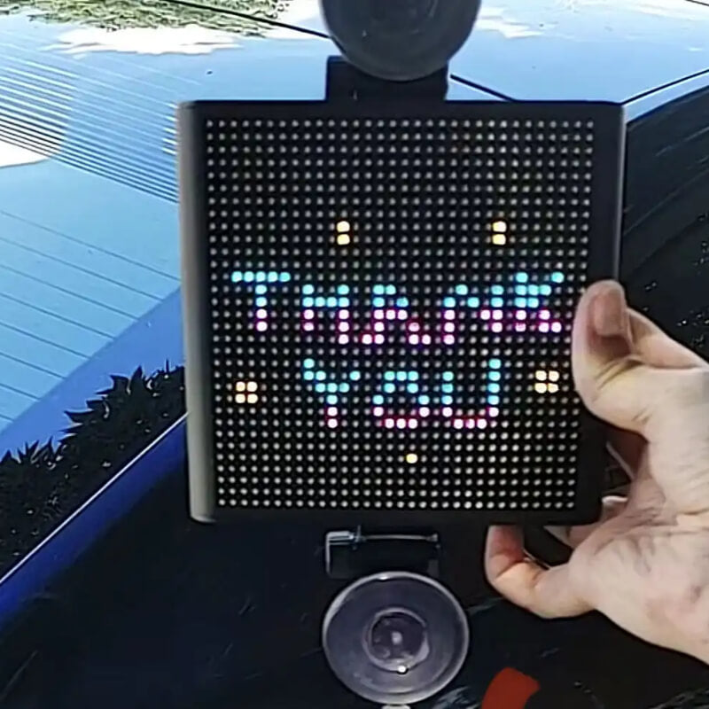 Car pixel LED display showing 'Thank You' message on PixBlock smart LED panel.
