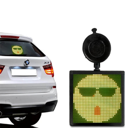 Car pixel LED display showcasing a fun emoji on a vehicle's rear window.