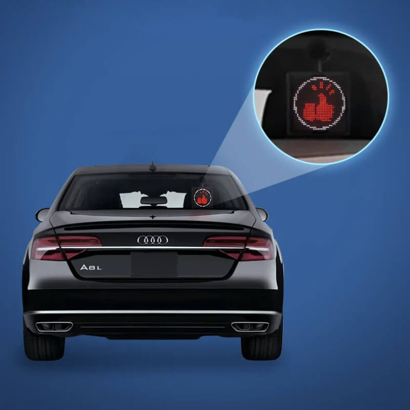 Car pixel LED display on vehicle window showcasing a thumbs up icon with bright pixel lighting.