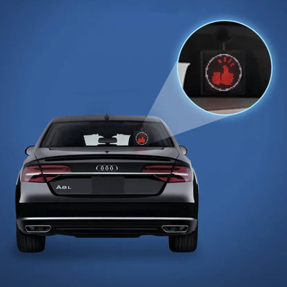 Car pixel LED display on vehicle window showcasing a thumbs up icon with bright pixel lighting.