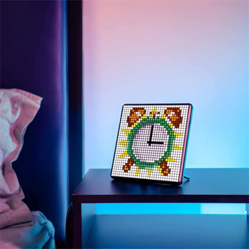 Car pixel LED display showing programmable clock design on a nightstand.