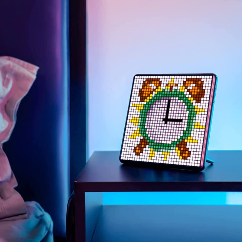 Car pixel LED display showcasing a colorful clock design on the PixBlock smart LED panel.